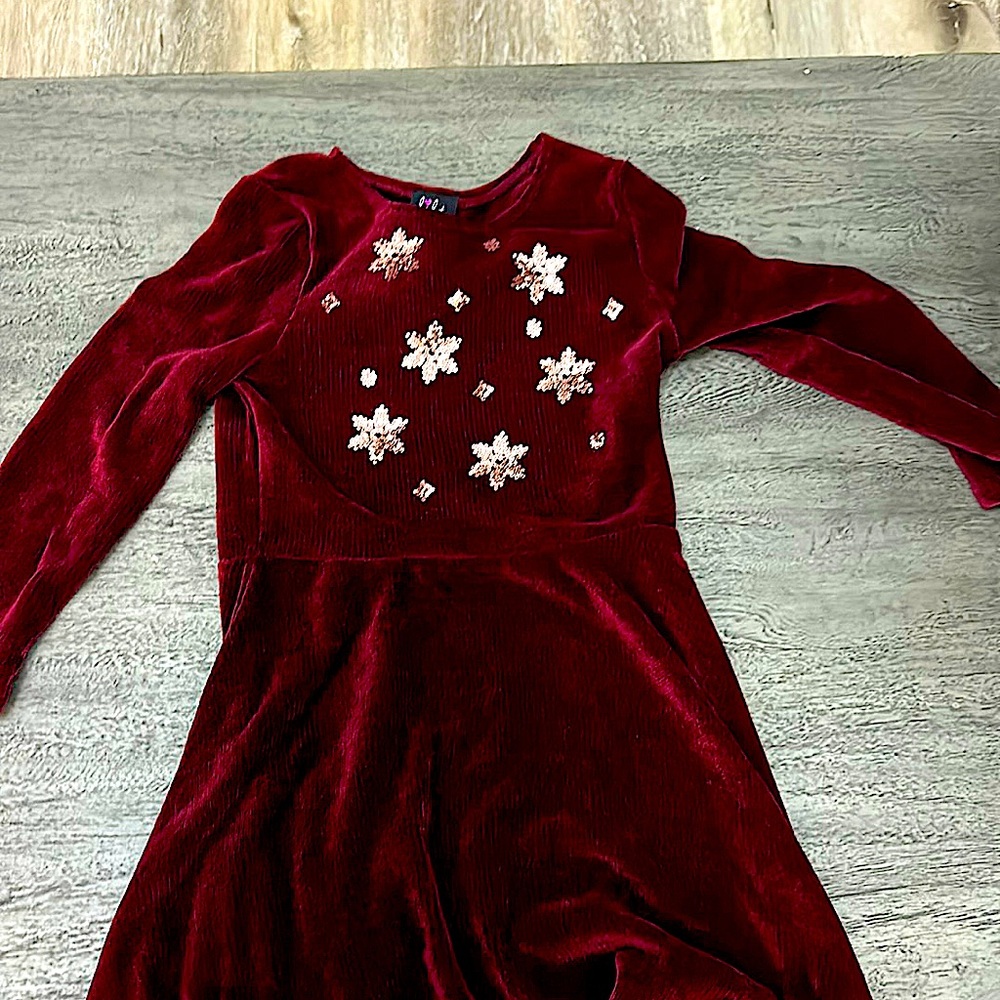 Christmas red dress with sequins snowflakes.